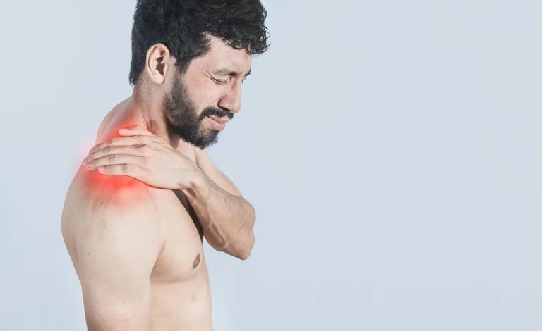 Neck pain and stress concept, shirtless man with neck muscle pain, Close up of a man with neck pain, a man with neck pain on an isolated background.