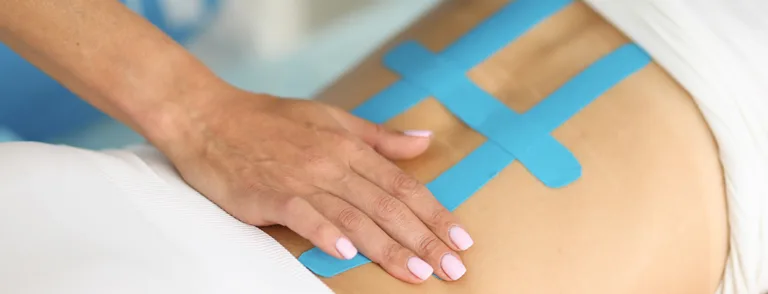 Kinesio taping of back is effective method of treating scoliosis and pain in clinic with elastic bands.